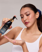 Model pushing aeco product onto hand 