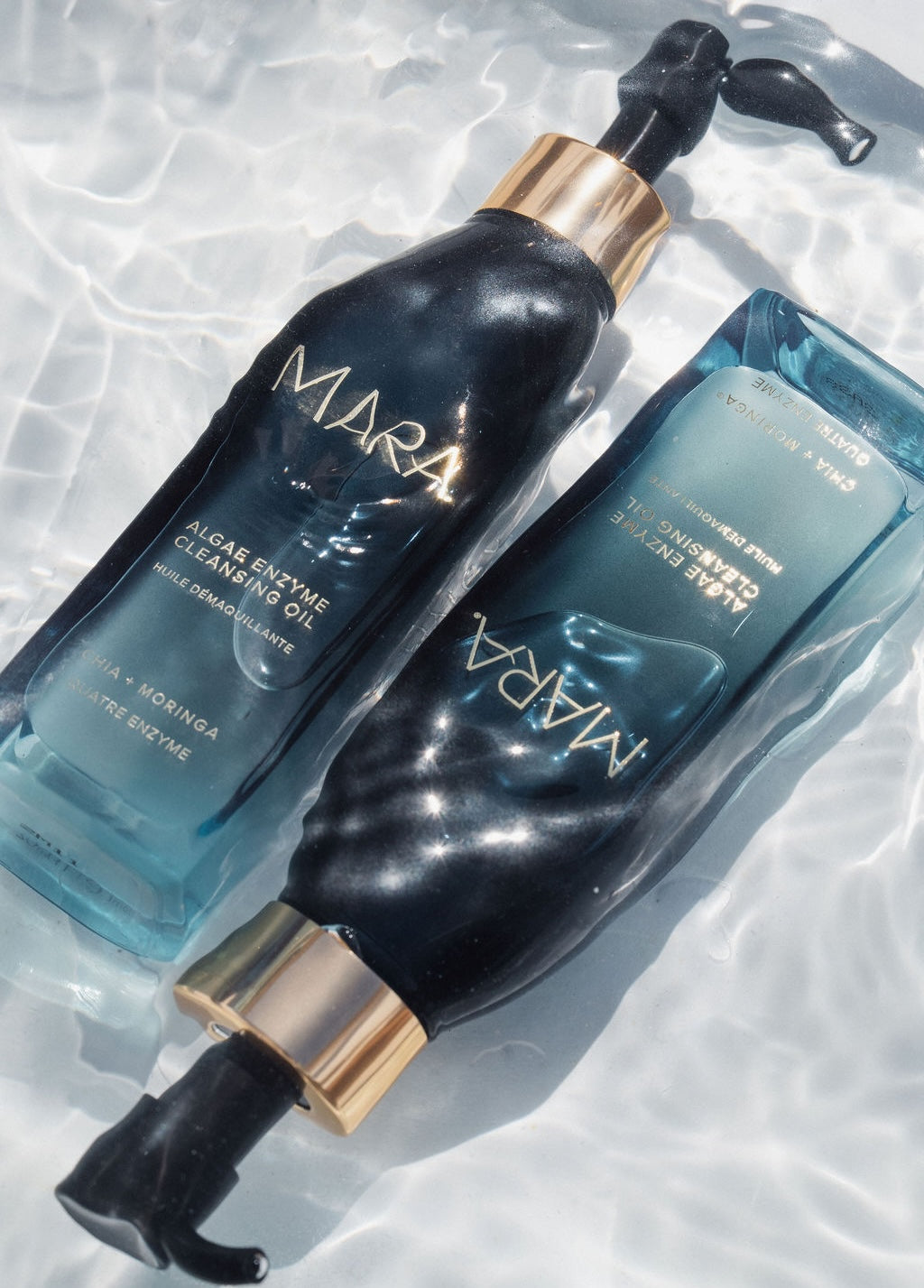 algae cleansing oil bottles under water 