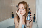 model removing makeup with MARA algae enzyme cleansing oil