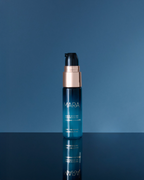 Deluxe+ Algae Enzyme Cleansing Oil on blue background