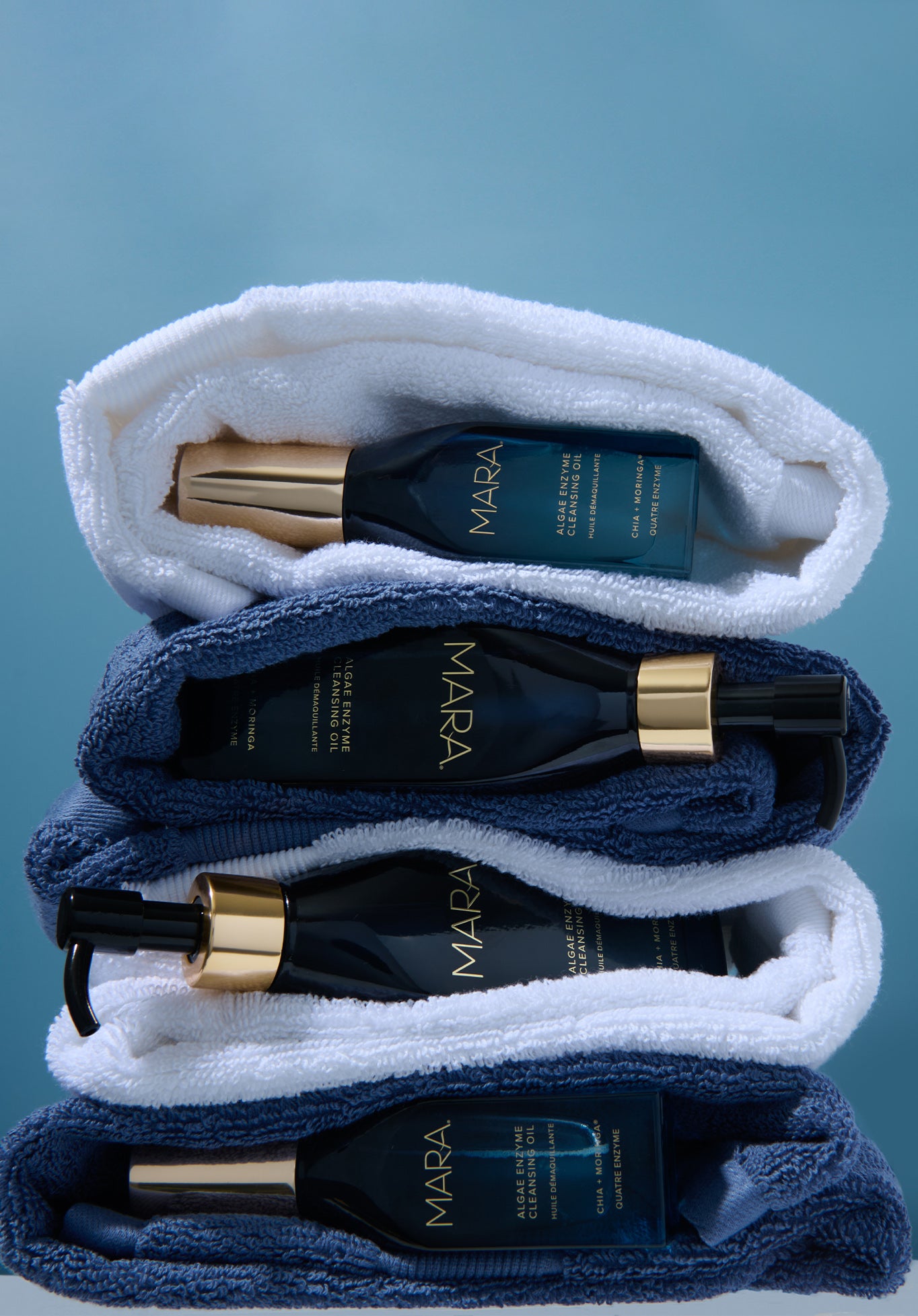 different size cleansers wrapped in towels
