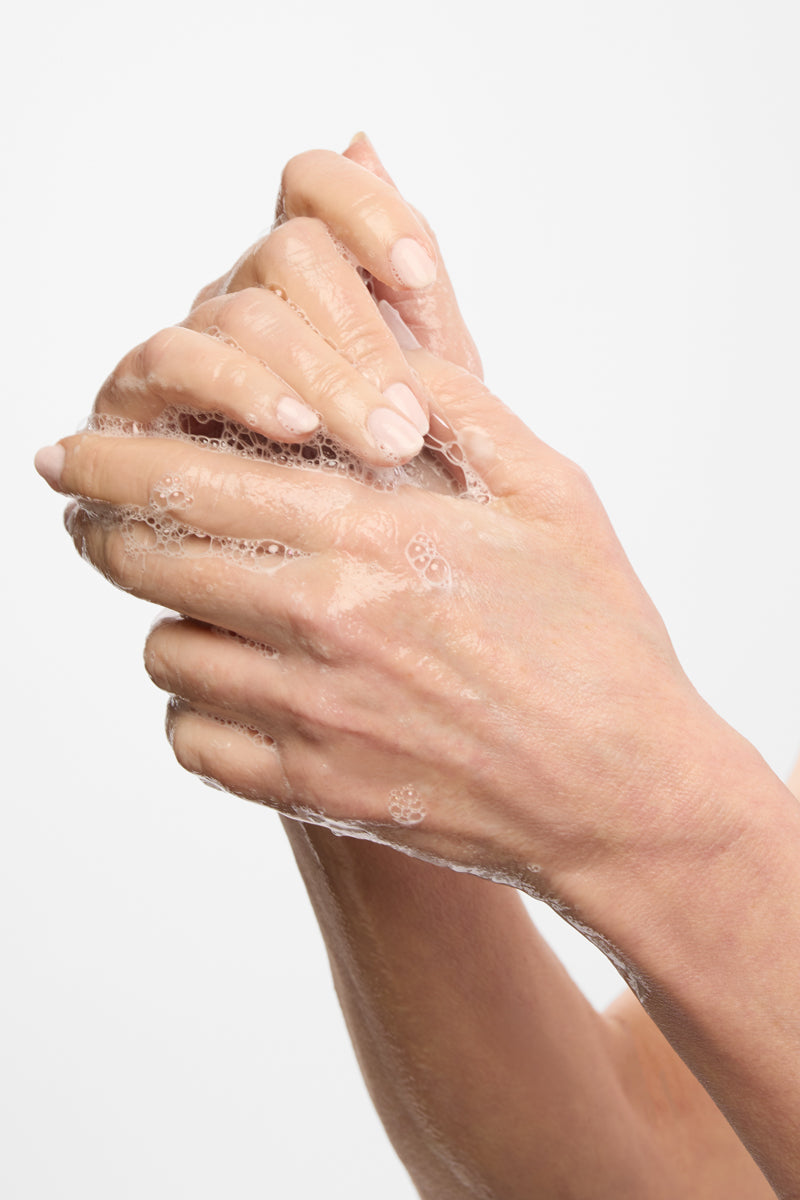 foamy hands rubbing together