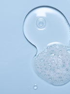 Close up of Aura Cleanse swatch on blue background