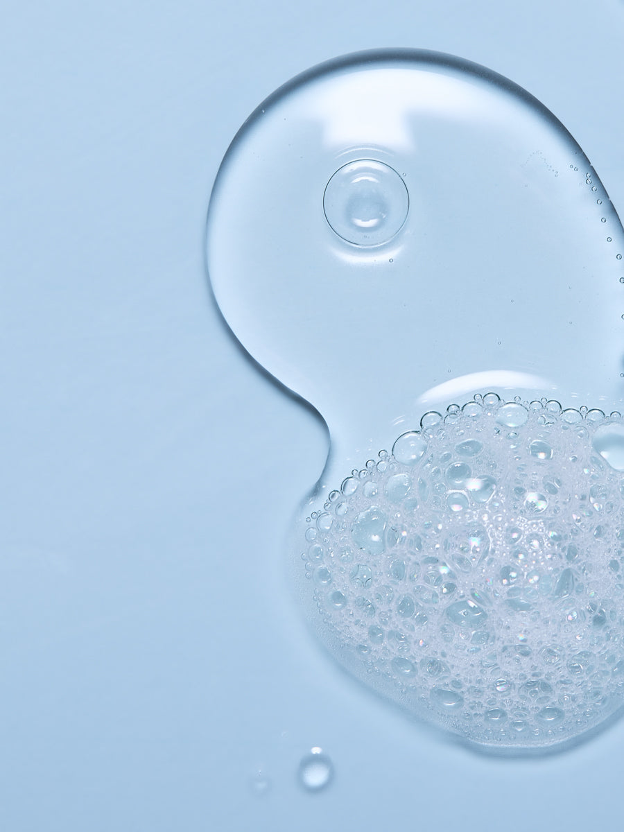 Close up of Aura Cleanse swatch on blue background