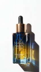 close up of algae retinol face oil bottle in the sunlight 