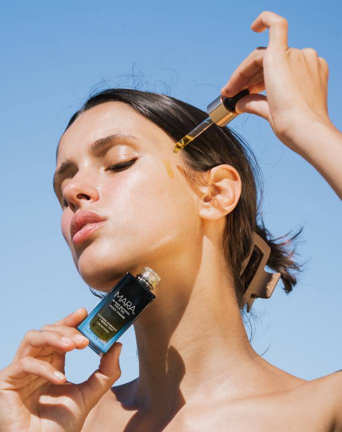 model using MARA Algae Retinol face oil