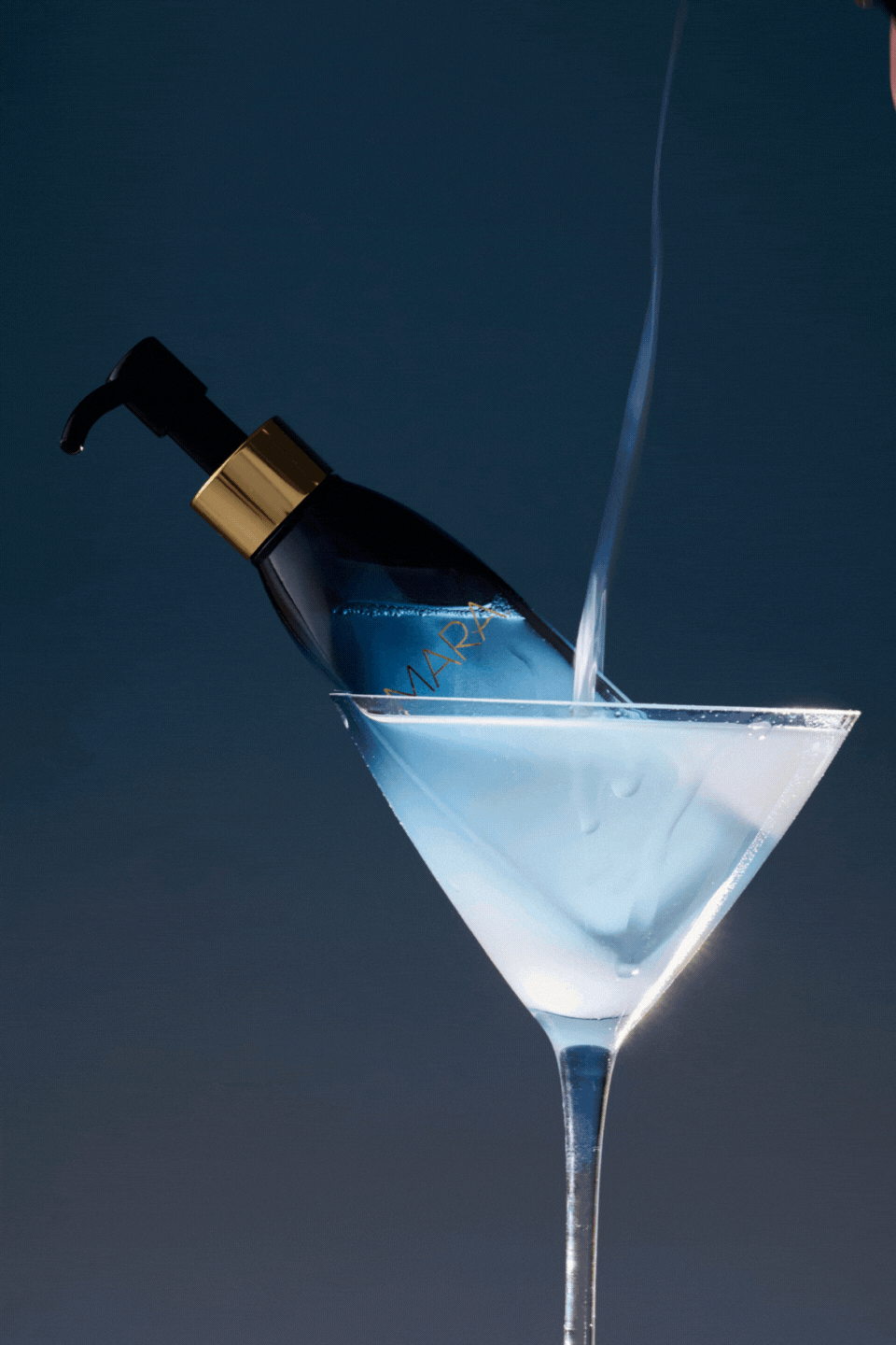 GIF of Algae Enzyme Cleansing Oil in a martini glass