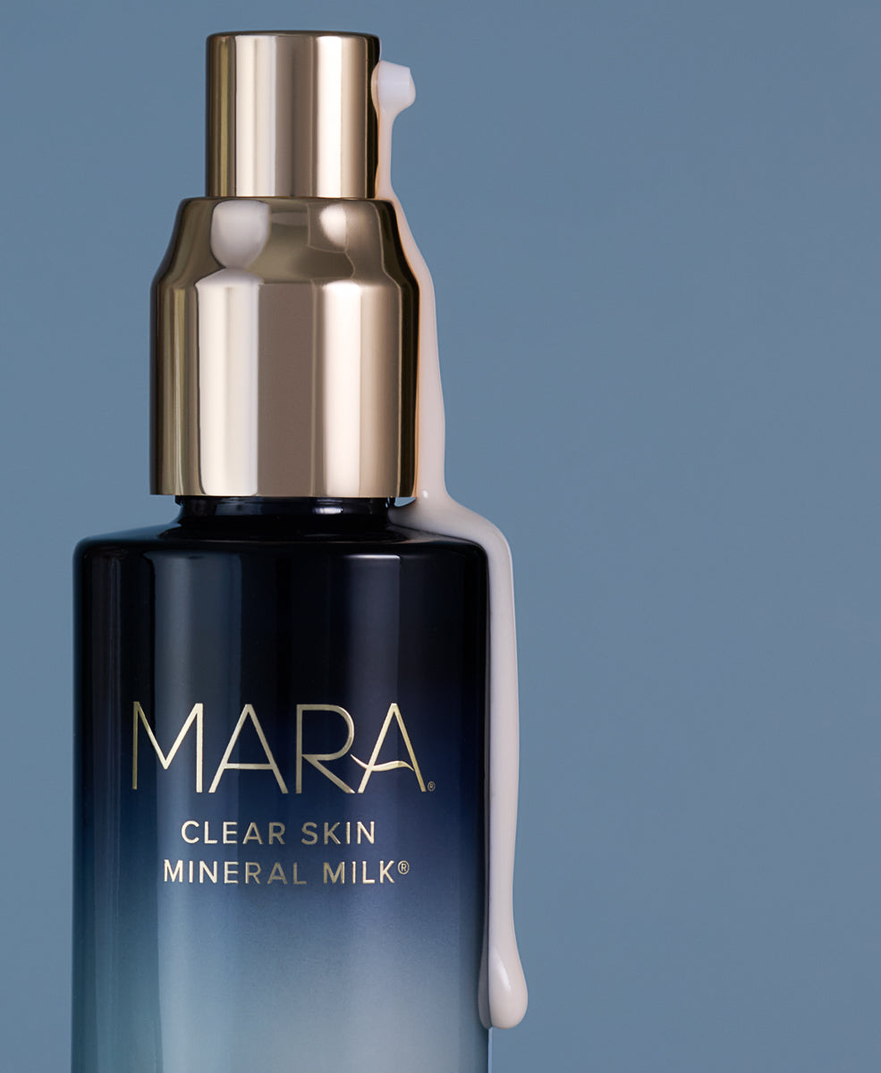 Clear Skin Mineral Milk on blue background