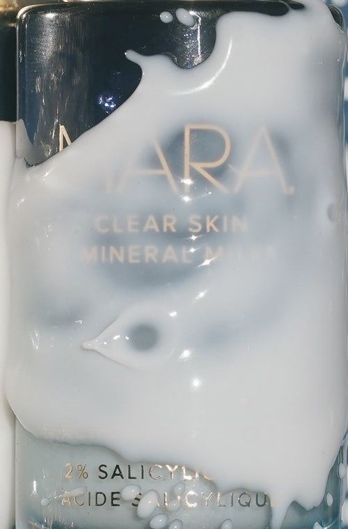 MARA Clear Skin Mineral Milk submerged in milk