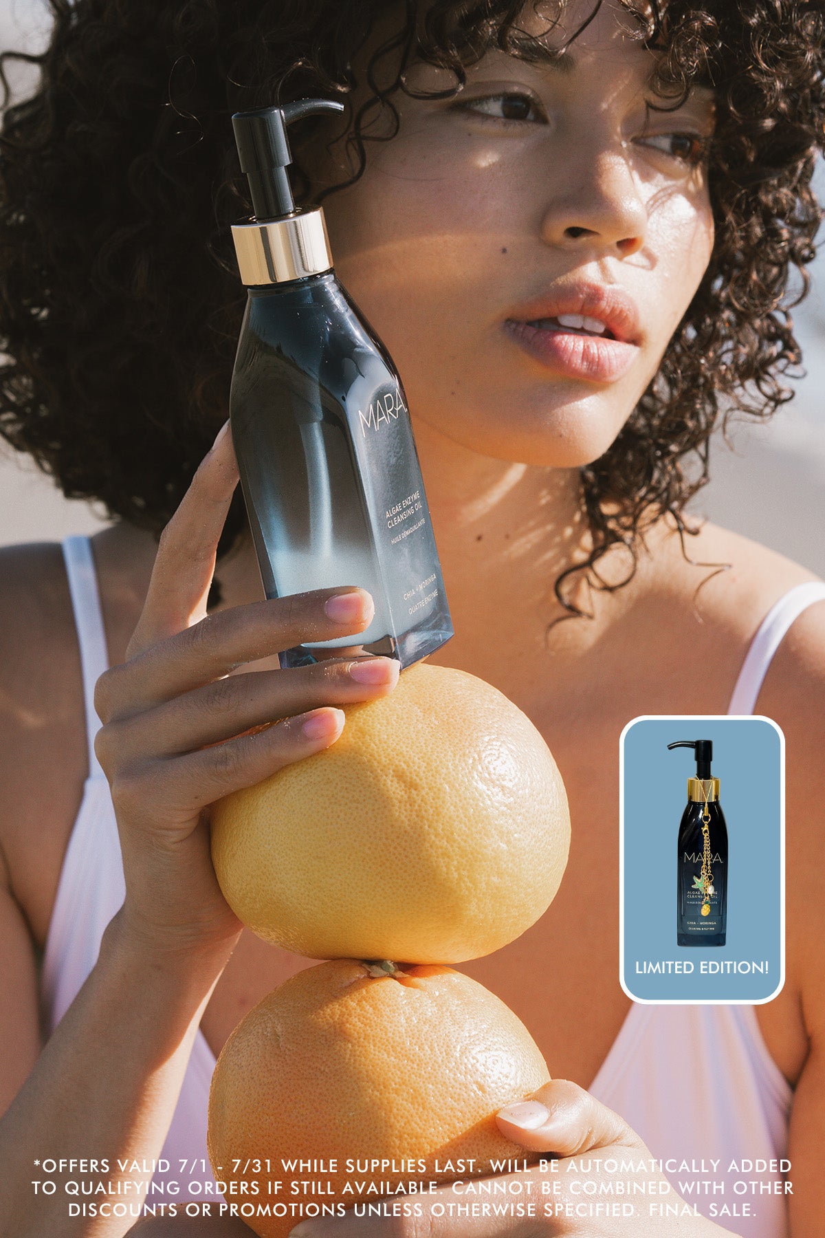 Girl holding Cleansing Oil and sticker showing limited edition charm