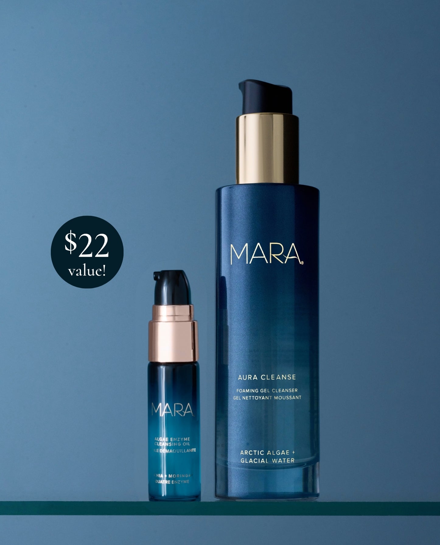Aura Cleanse and Deluxe Cleansign Oil on glass shelf with blue background