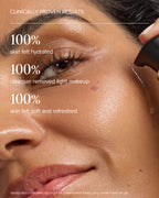 close up of woman's face with Aura Cleanse Foaming Gel Cleanser on her cheek and proven results 