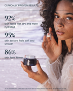 Woman holding Sea Dream Algae Creme with some product on her finger, and clinically proven results 