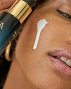 Close up of MARA Sea Kale Sunscreen on woman's face