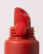 Close up of MARA Sea Silk Lip Balm Coral product 