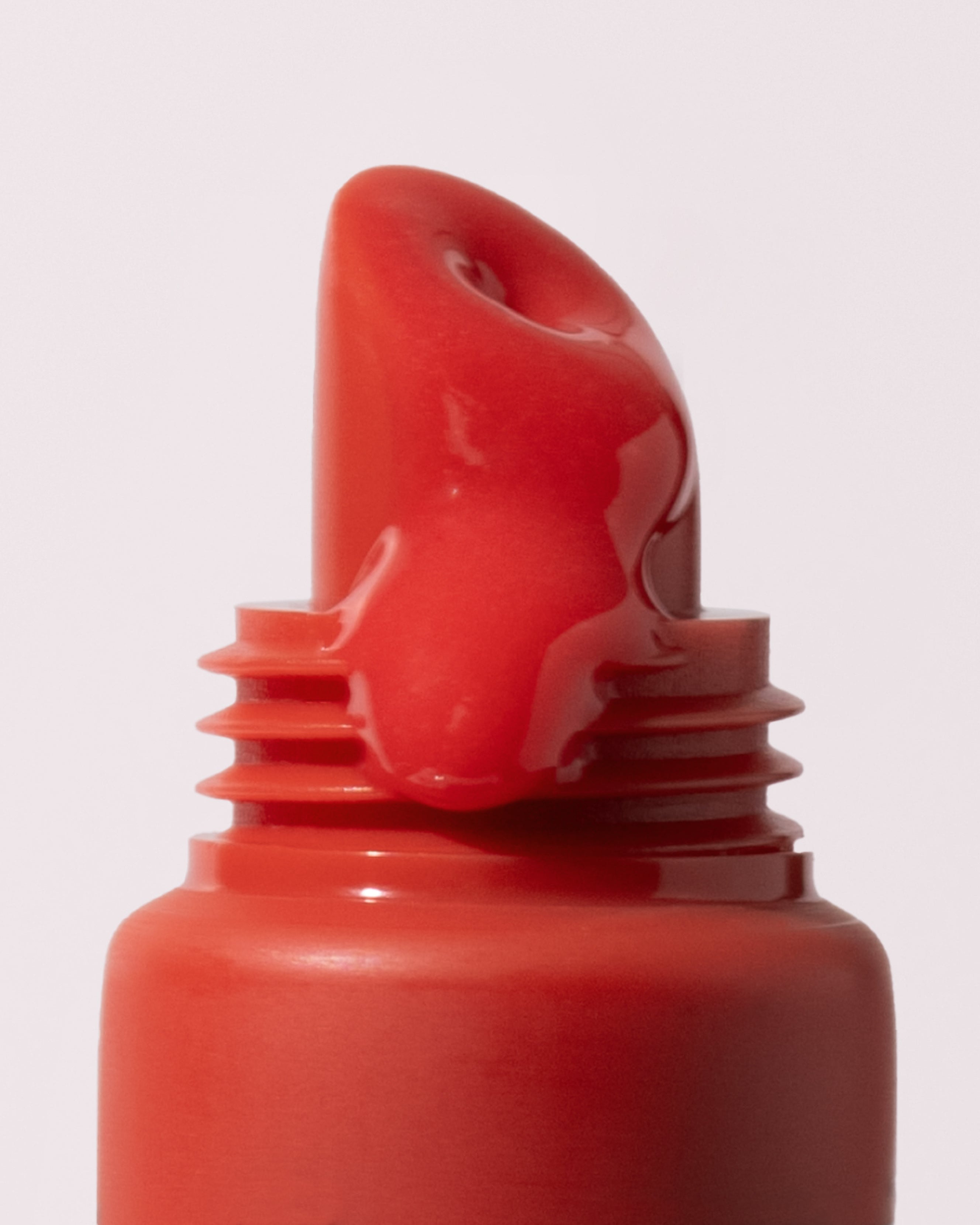 Close up of MARA Sea Silk Lip Balm Coral product 