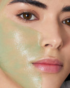 Close up of MARA Volcanic Sea Clay Detox Masque on woman's face