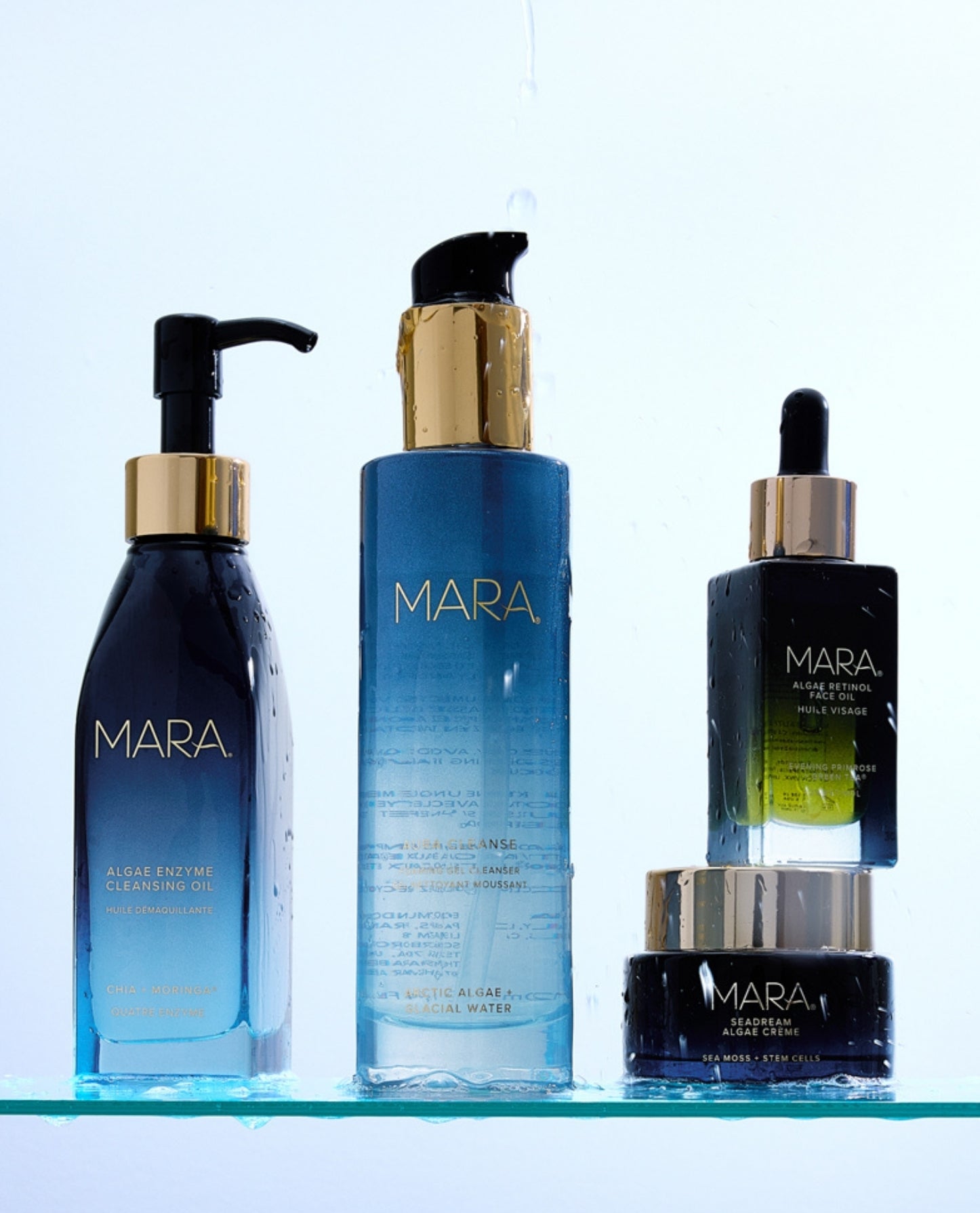 Set of MARA products on a glass shelf with a light blue gradient background