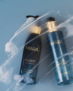Algae Enzyme Cleansing Oil and Aura Cleanse Foaming Gel Cleanser on blue background