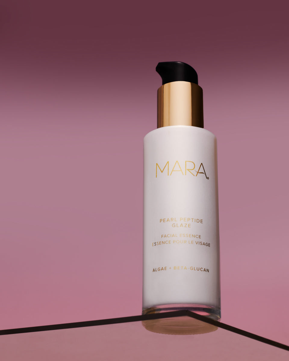 Pearl Peptide Glaze on glass shelf on pink backgroun