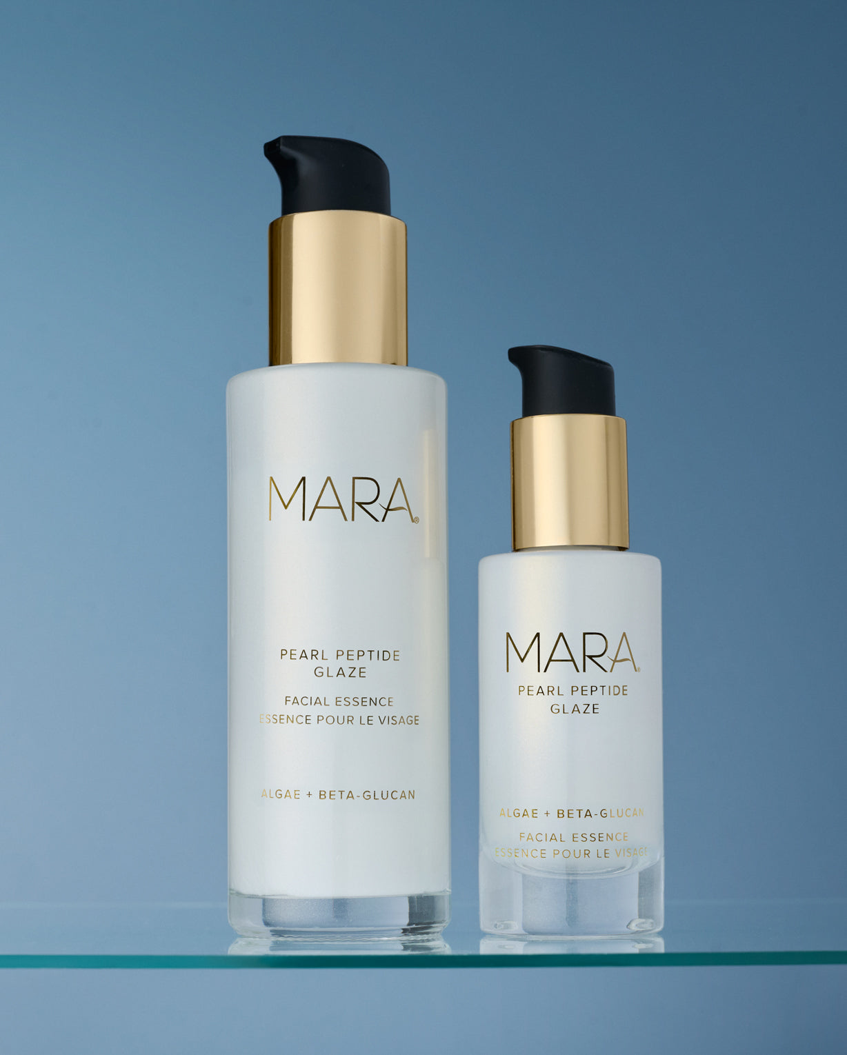 Two sizes of mARA Pearl Peptide Glaze on a glass shelf with a blue gradient background