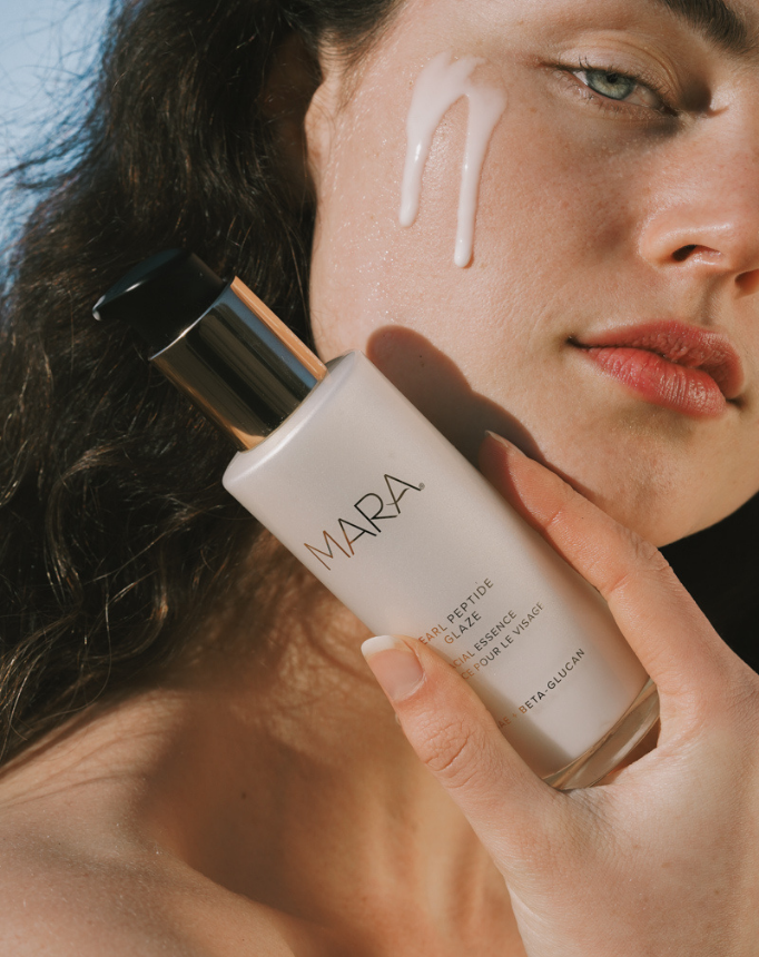 Step pearl peptide glaze on skin with model