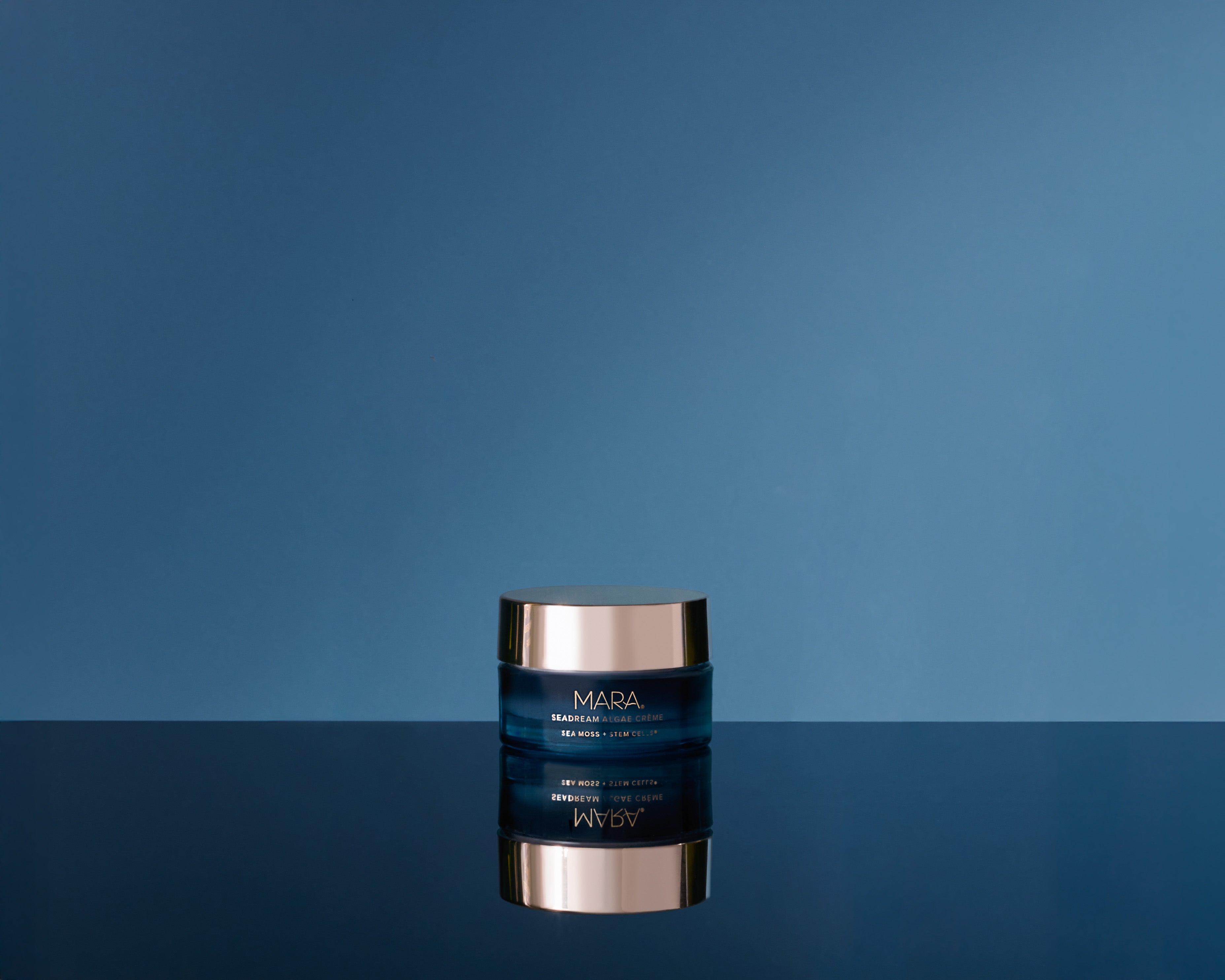 Mini SeaDream Algae Creme on blue background