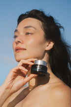 Model holding SeaDream Algae Creme