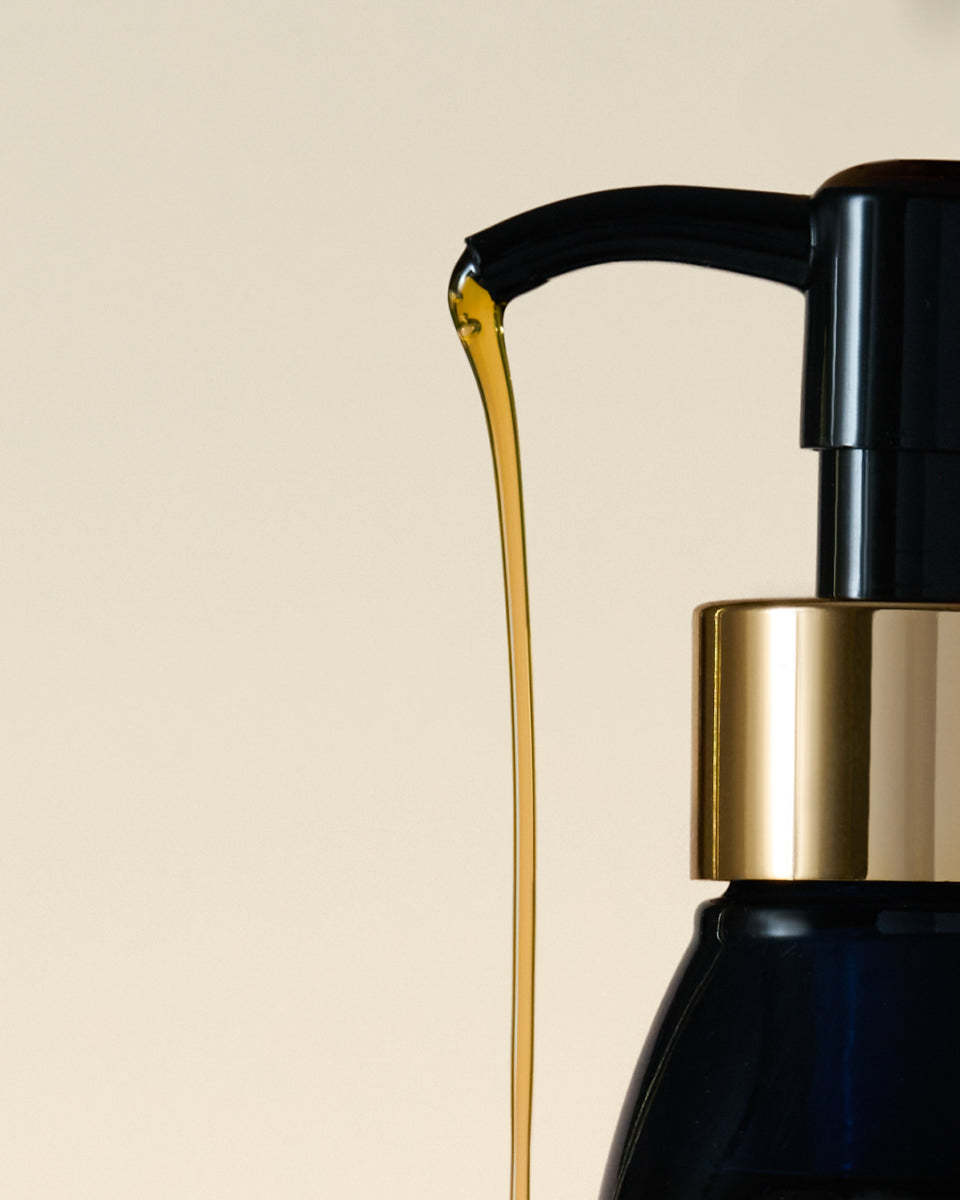 close up of Sea Sculpt Body Oil being pumped out