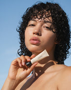 Person holding Clear Sea Silk Lip Balm