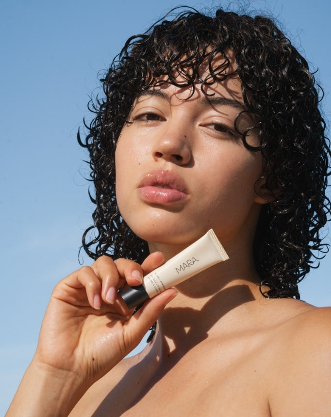 Person holding Clear Sea Silk Lip Balm