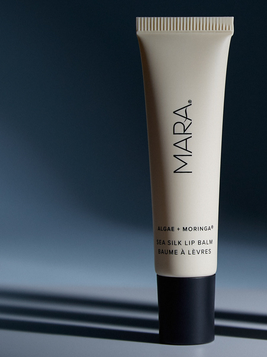 Clear Sea Silk Lip Balm on dark blue background