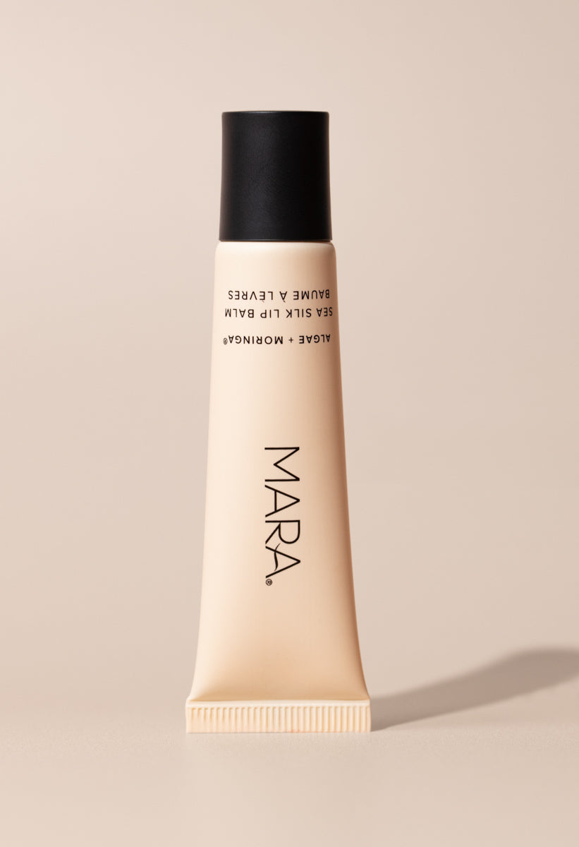 Clear Sea Silk Lip Balm on beige background