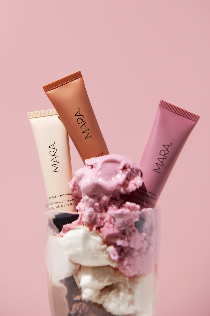Three Sea Silk Lip Balm shades in Neapolitan ice cream on a pink background