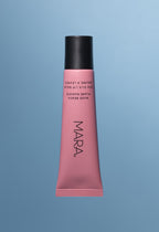 Nude Beach Sea Silk Lip Balm on blue background