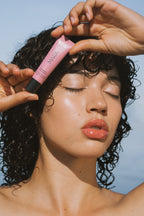 Model wearing Sea Silk Lip Balm in Nude Beach