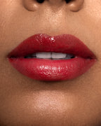 Close-up of a person's lips wearing Toasty Rouge Sea Silk Lip Balm