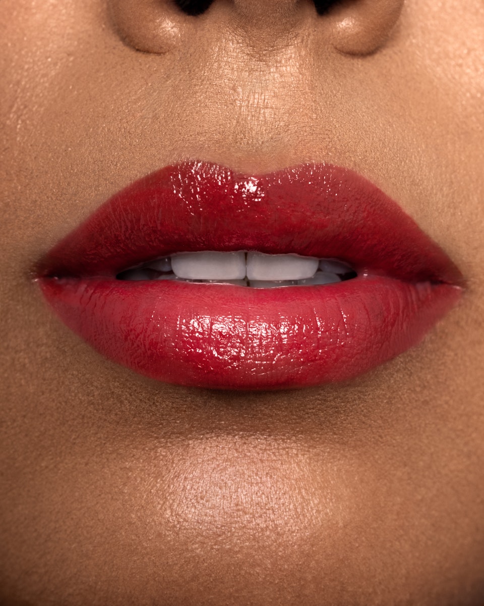 Close-up of a person's lips wearing Toasty Rouge Sea Silk Lip Balm