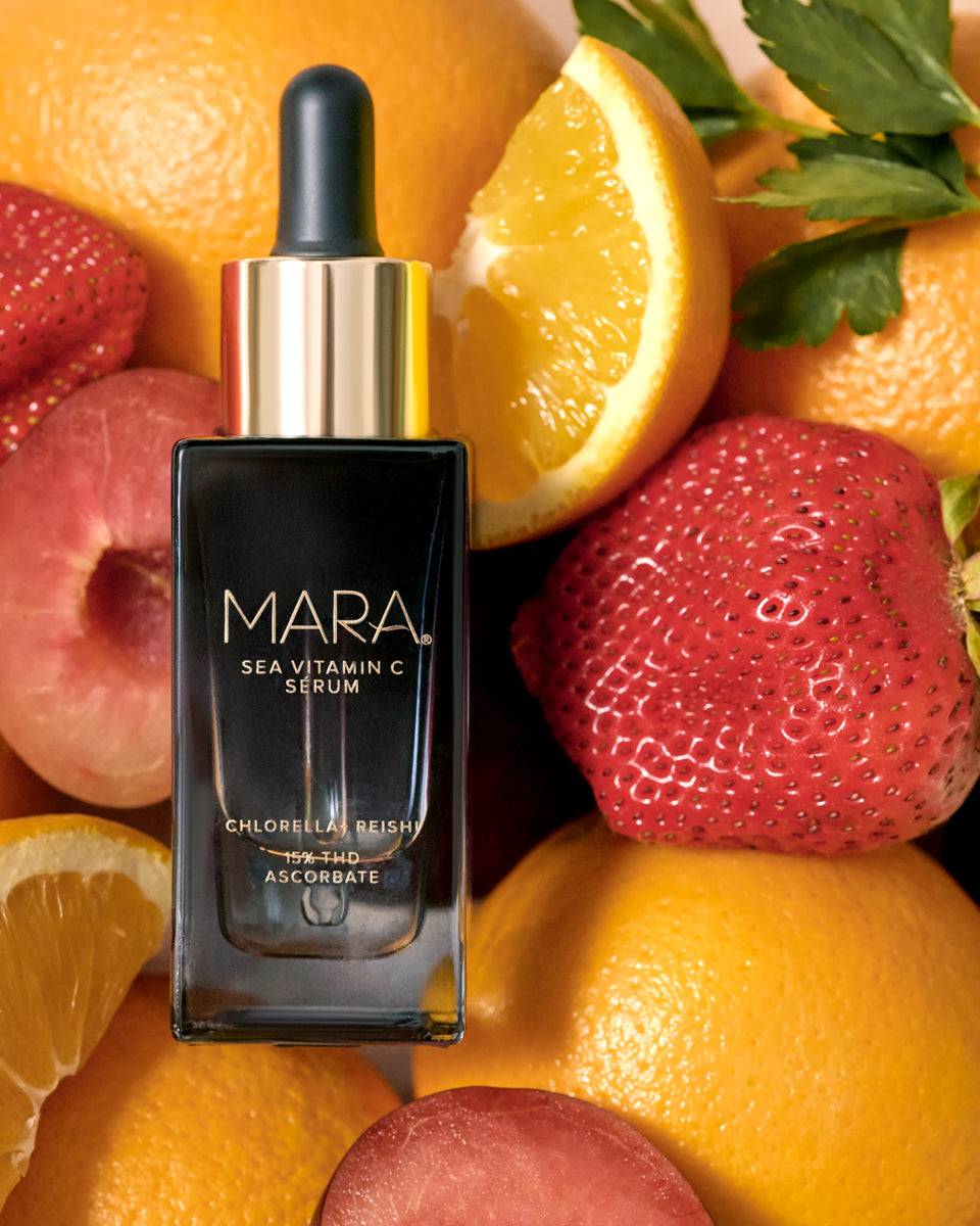 MARA Sea Vitamin C Serum surrounded by fruits