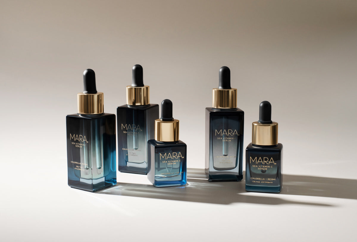 multiple sizes of Sea Vitamin C Serum on beige background