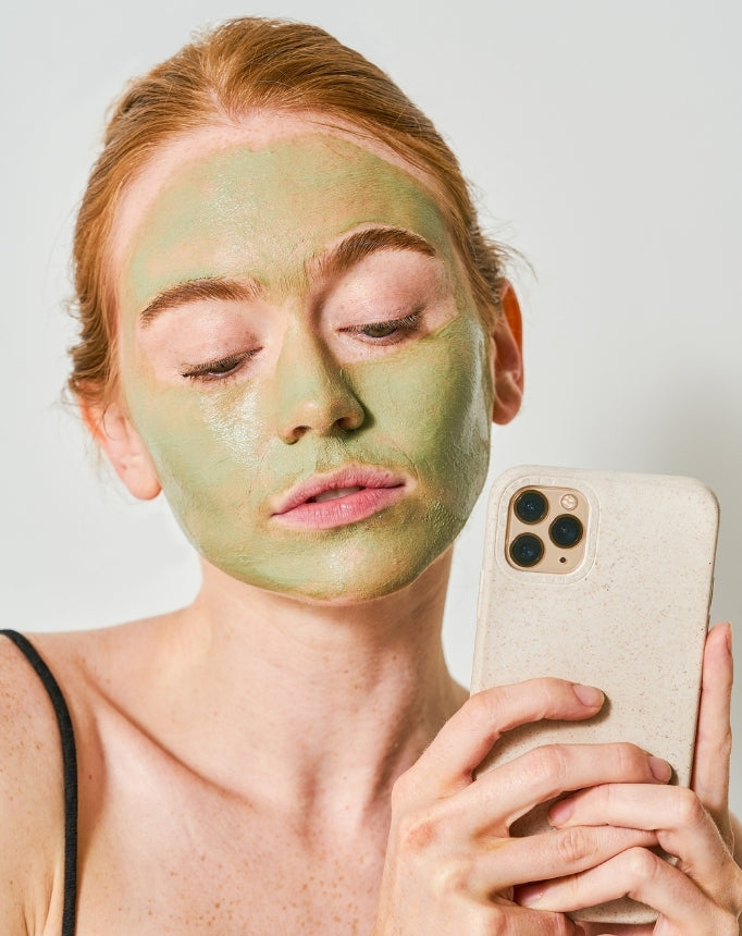 woman with volcaninc sea clay detox masque on face
