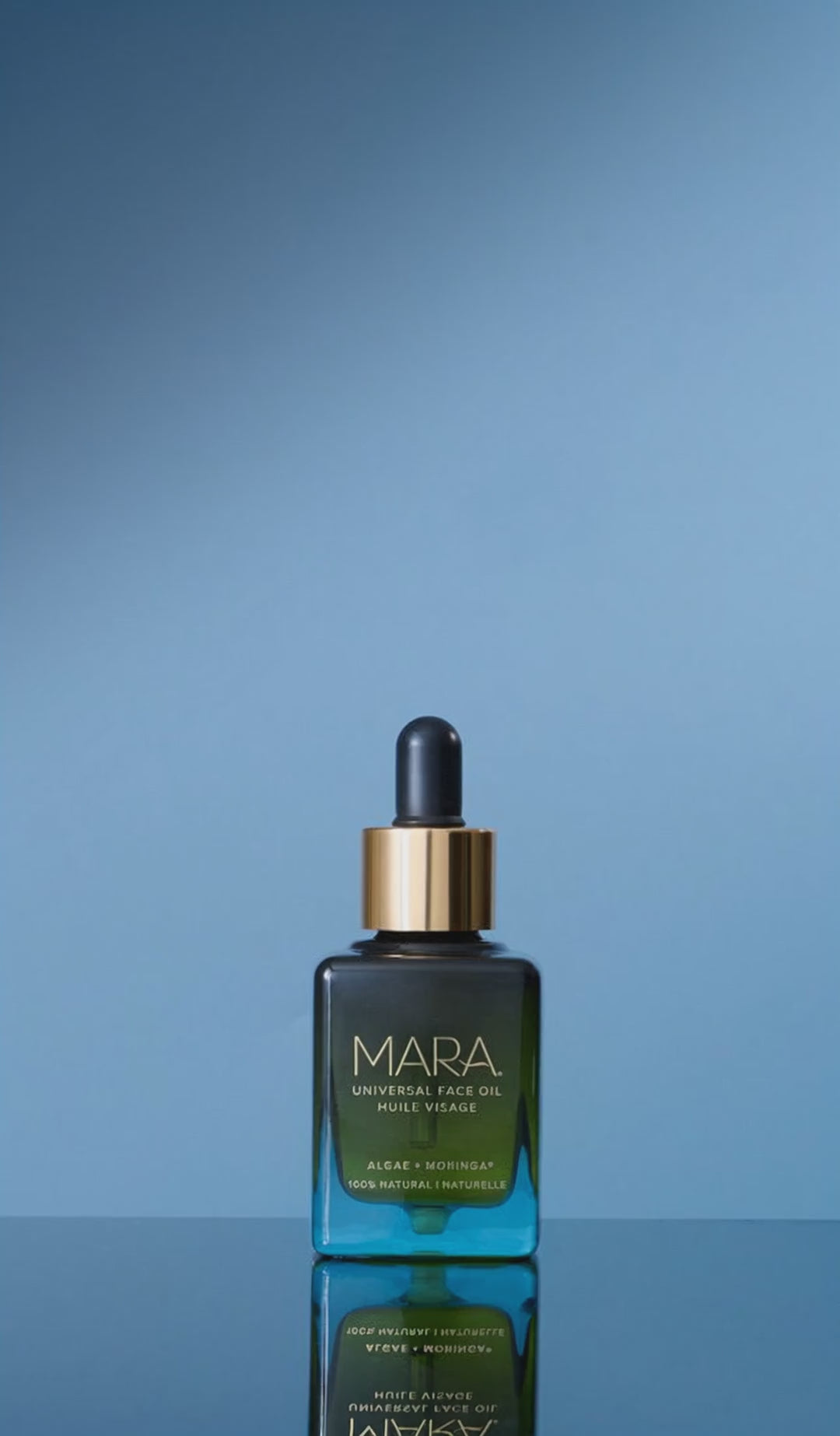 water splashing on Universal Face Oil 