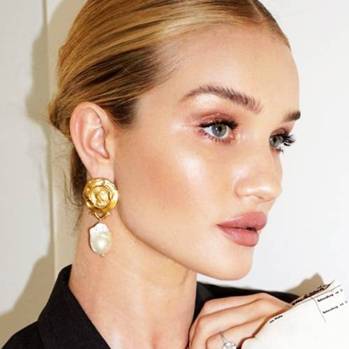 The 15 Products Rosie Huntington-Whiteley Wears to Achieve “Sun-Kissed Glamour”